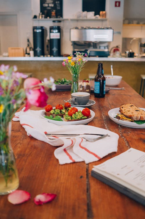 Sandwiches and Coffee on Wooden Table