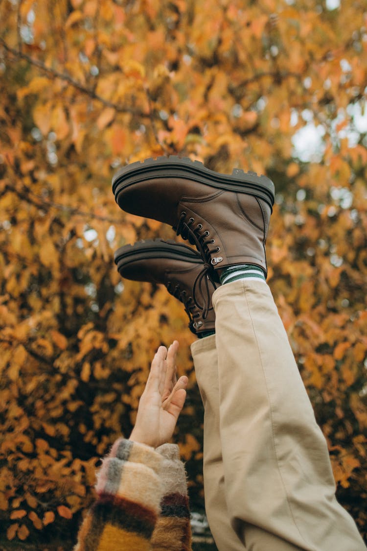 Person Reaching For His Shoes