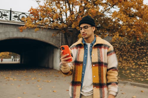 A Man Holding an Iphone