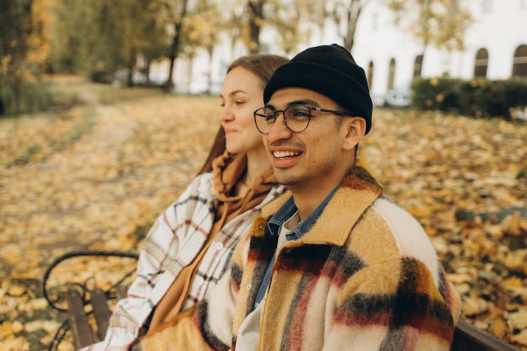 A Couple Sitting On The Bench