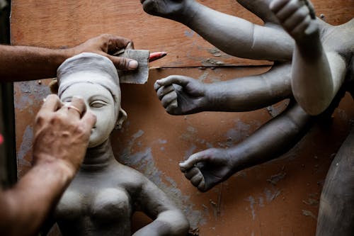 Close up of a Person Sculpting