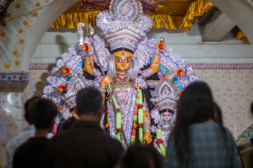 People Looking at Goddess Durga Maa Idol