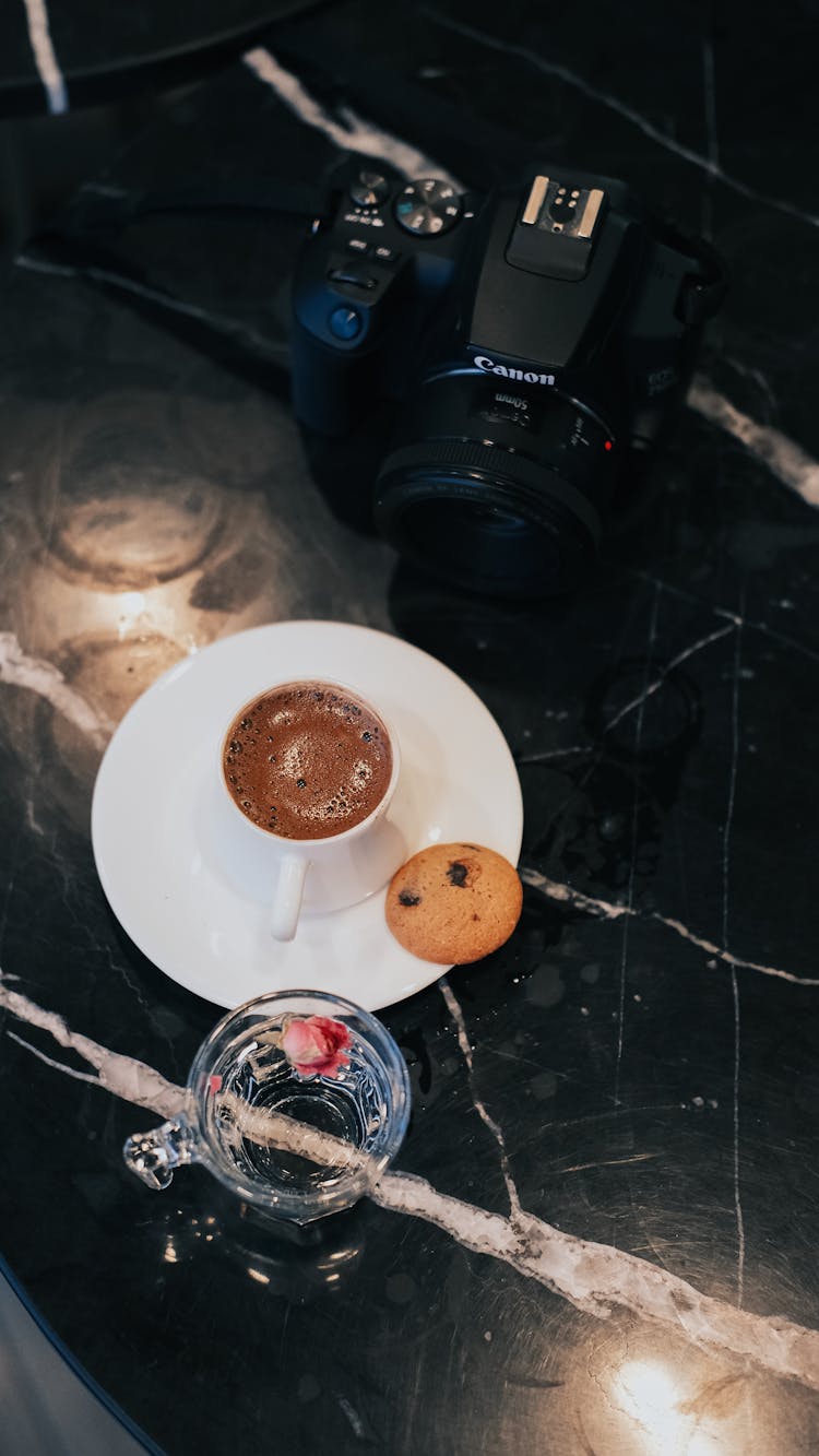 Coffee With Cookie In Front Of Camera