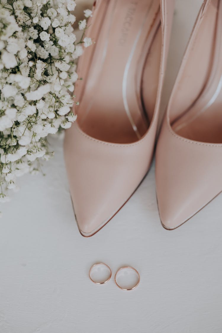 Elegant Pink Shoes And Wedding Rings