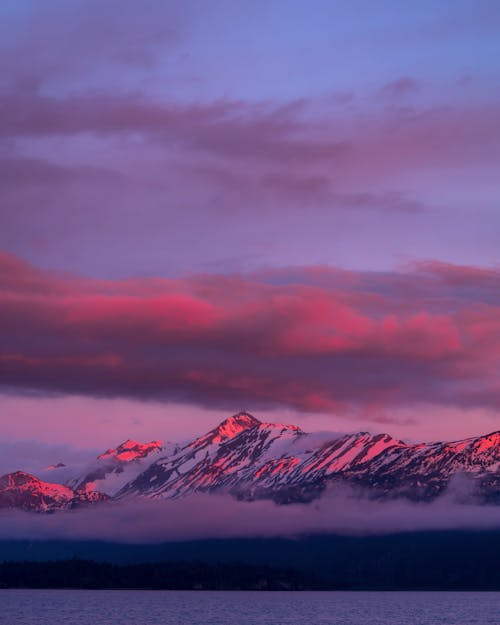 Free Clouds and Snowcapped Mountain Stock Photo
