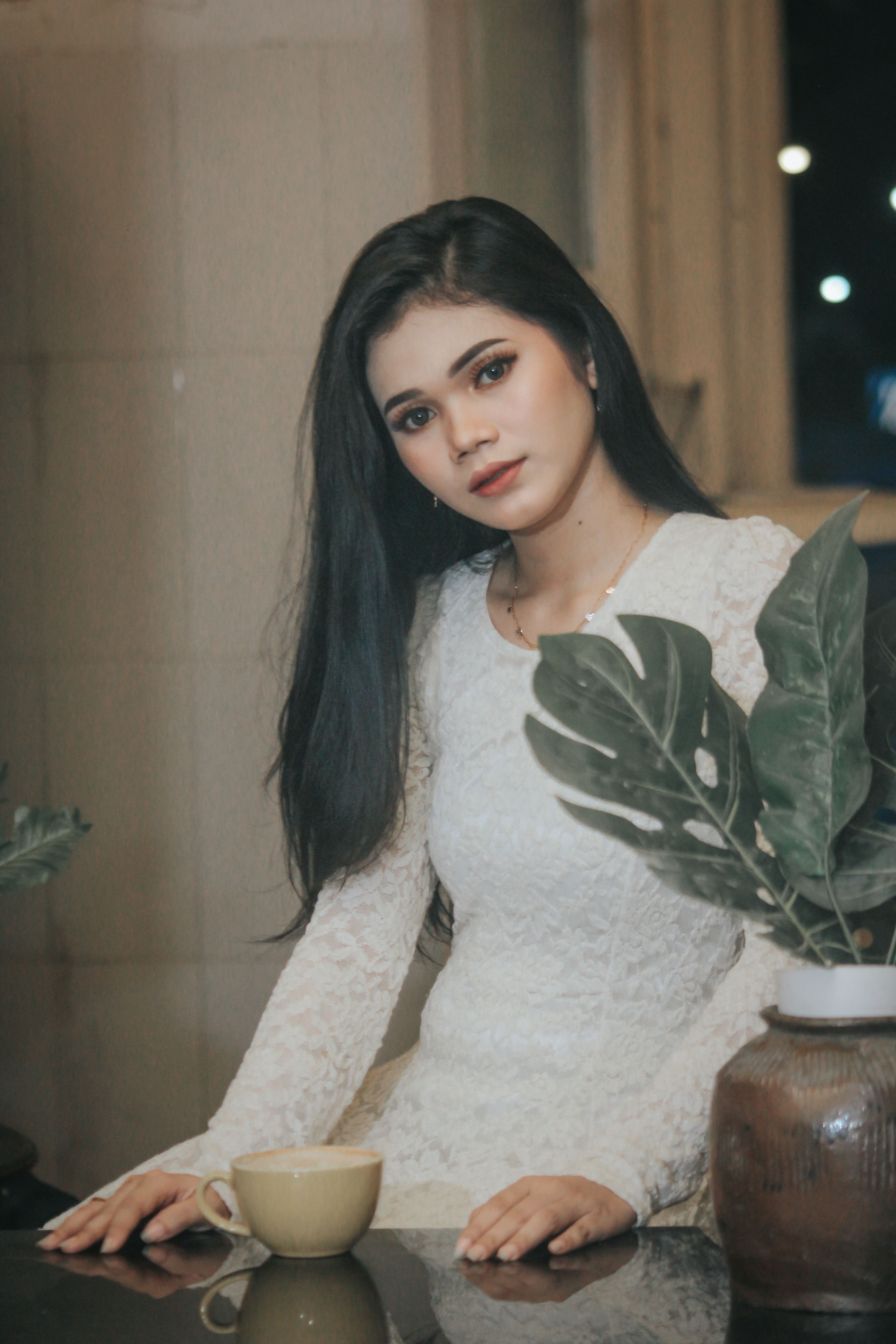 Woman in White Long Sleeve Dress · Free Stock Photo