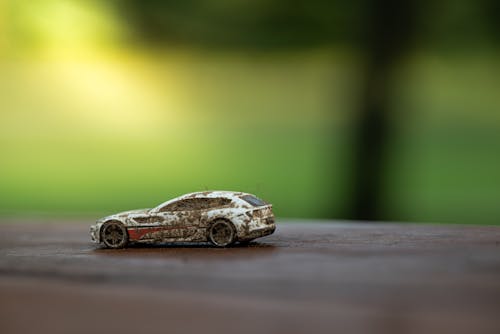 Close-up Shot of a Dirty Miniature Car 