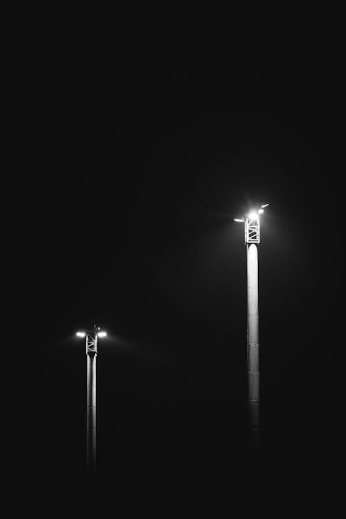 White Lamp Post During Night Time