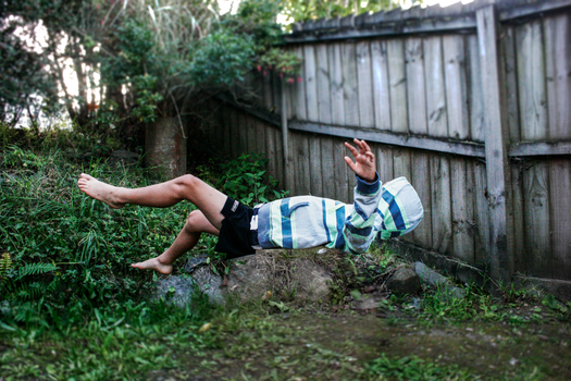 Floating Photography of Man in White and Blue Striped Top