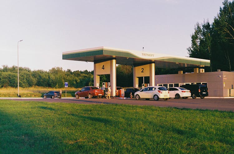 Cars Lined Up At A Gasoline Station