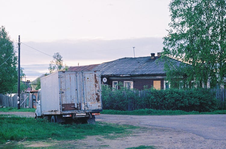 Village House And An Old Truck 