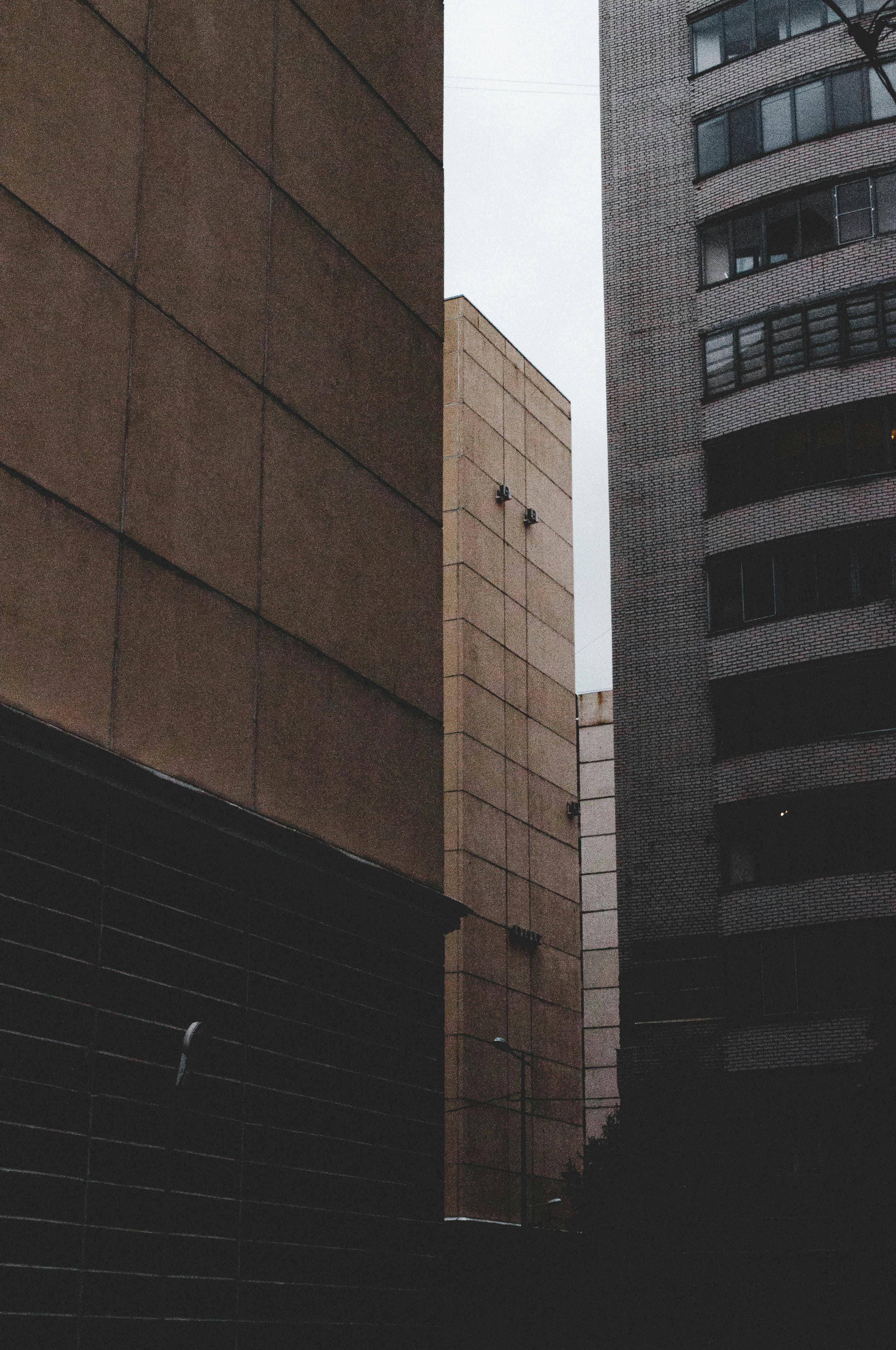 Low angle view of high-rise buildings showcasing urban architecture.