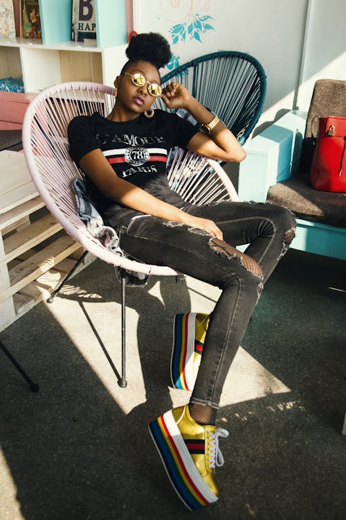 Free Photo of Woman Sitting on Chair Stock Photo