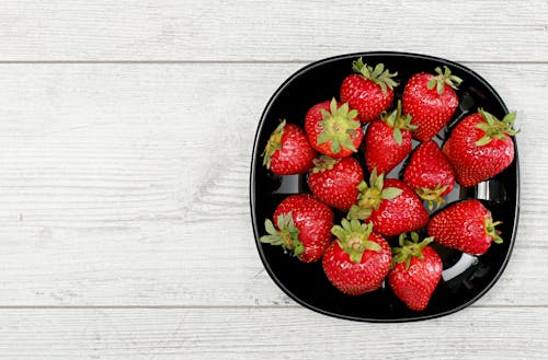 Free Strawberries on Black Ceramic Bowl Stock Photo