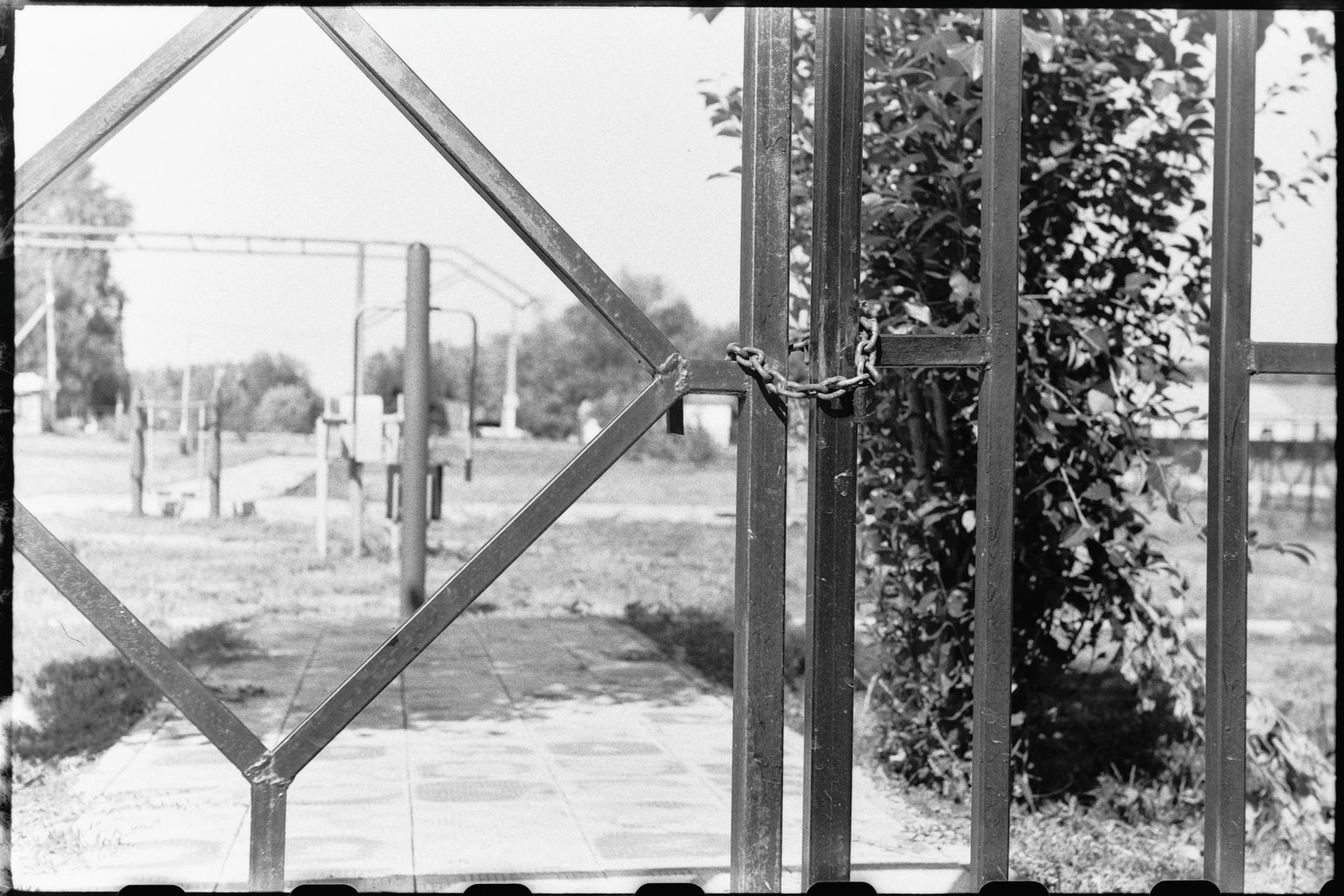 Steel Fence Closed with a Padlock