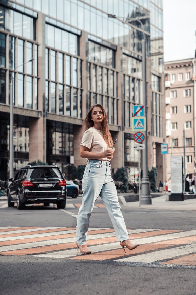 A Woman Crossing The Street