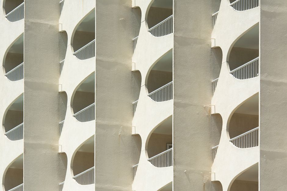 Abstract facade view of a modern building in La Grande-Motte, showcasing unique geometric design.