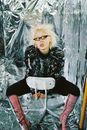 A Person Wearing Retro Sitting on a Swivel Chair