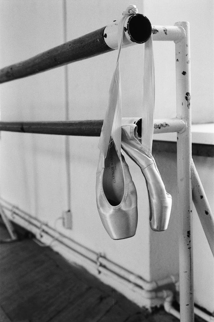 Ballet Shoes Hanging On A Pole 