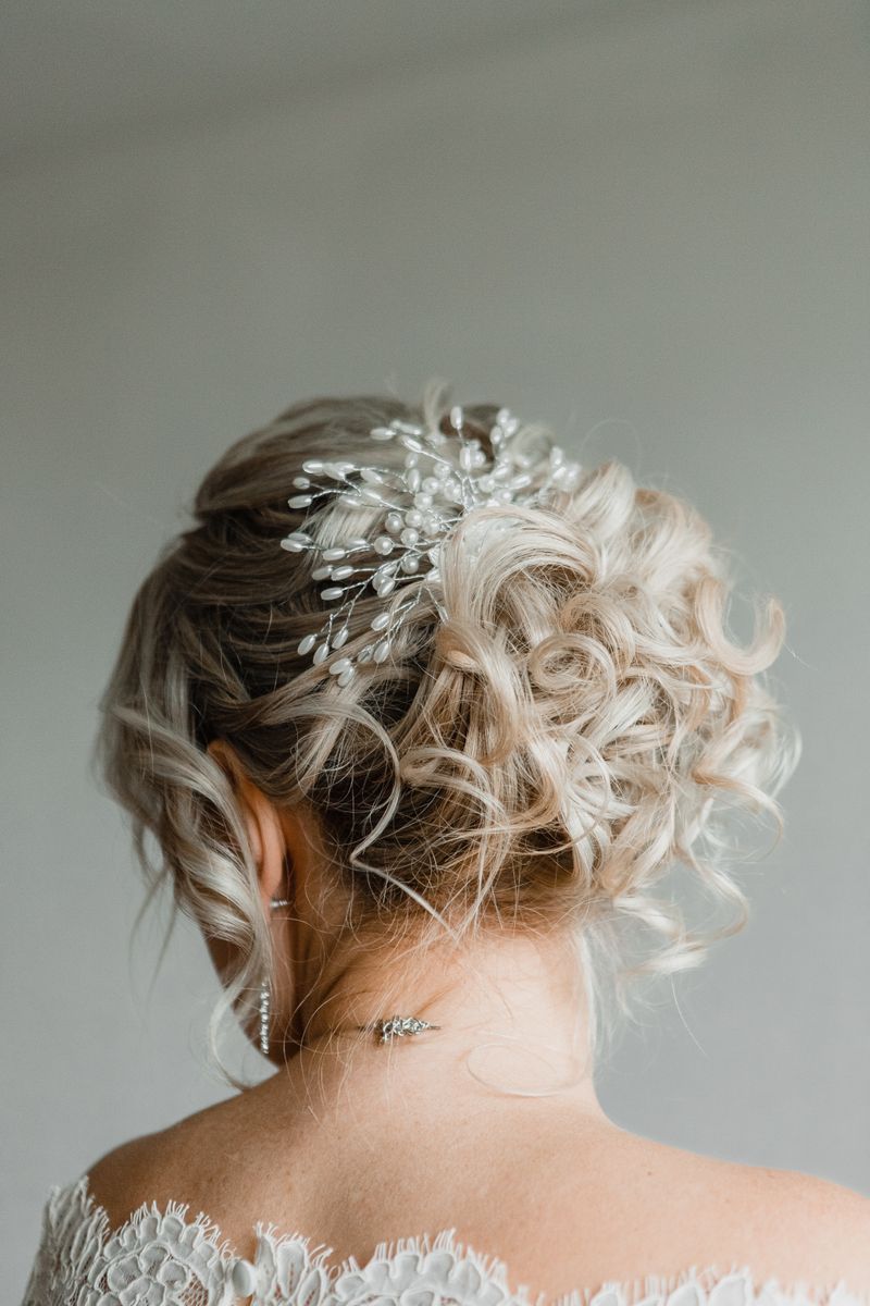 Elegant updo with decorative hairpiece