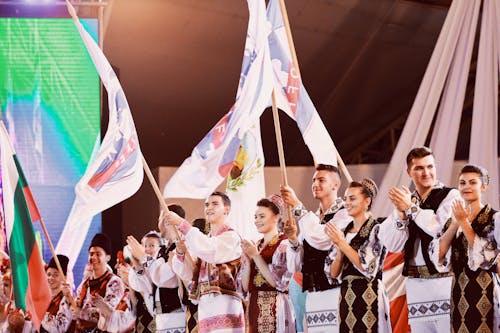 People in Romanian Traditional Clothing at Festival