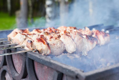 Grilled Meat on Charcoal Grill