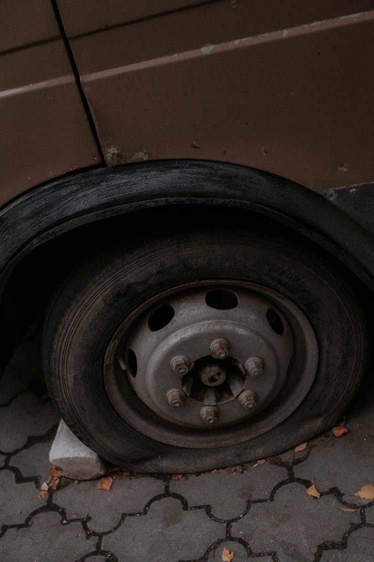 Close Up Photo Of A Flat Tire