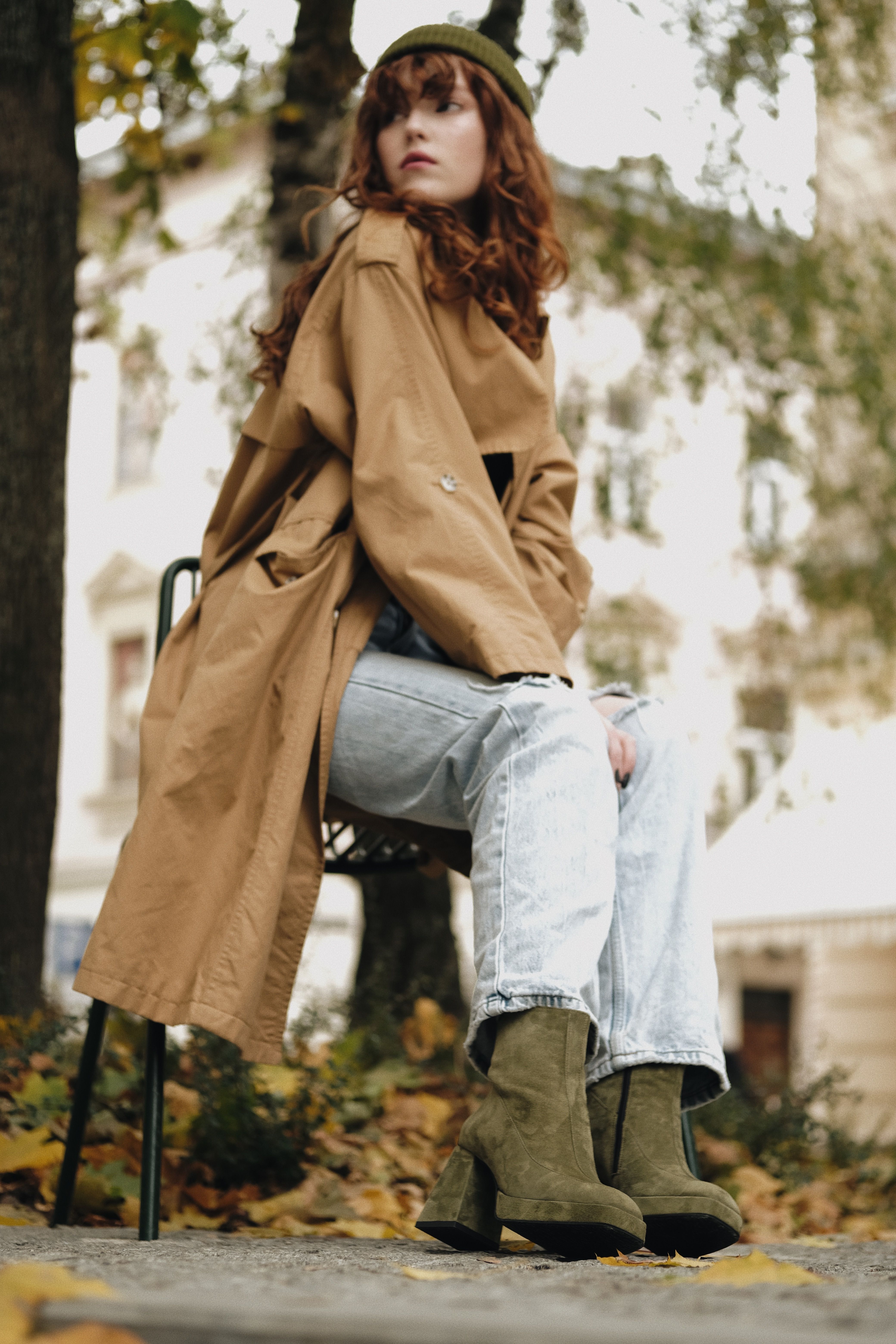 A Woman in Brown Coat Posing · Free Stock Photo