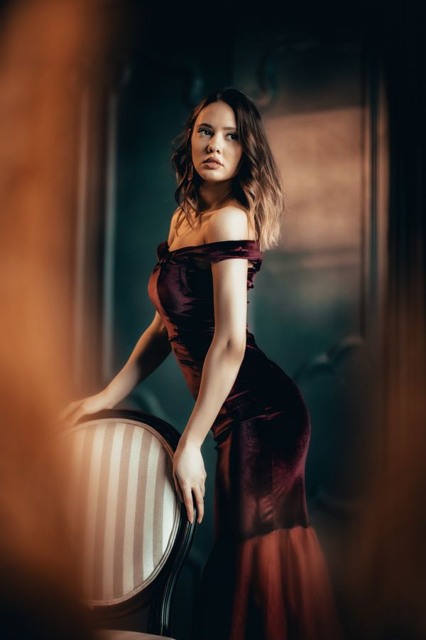 Woman in velvet midi dress