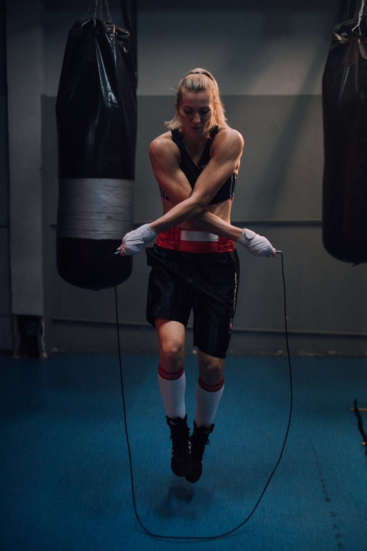 Woman With Crossed Arms Skipping Rope