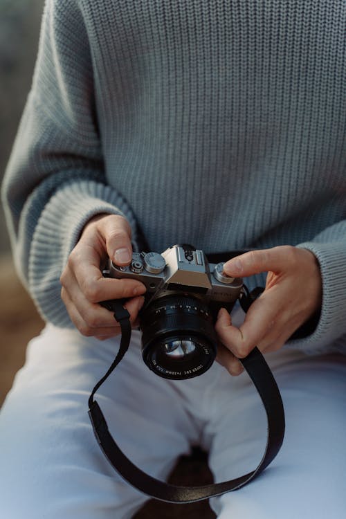 Person Holding a Camera