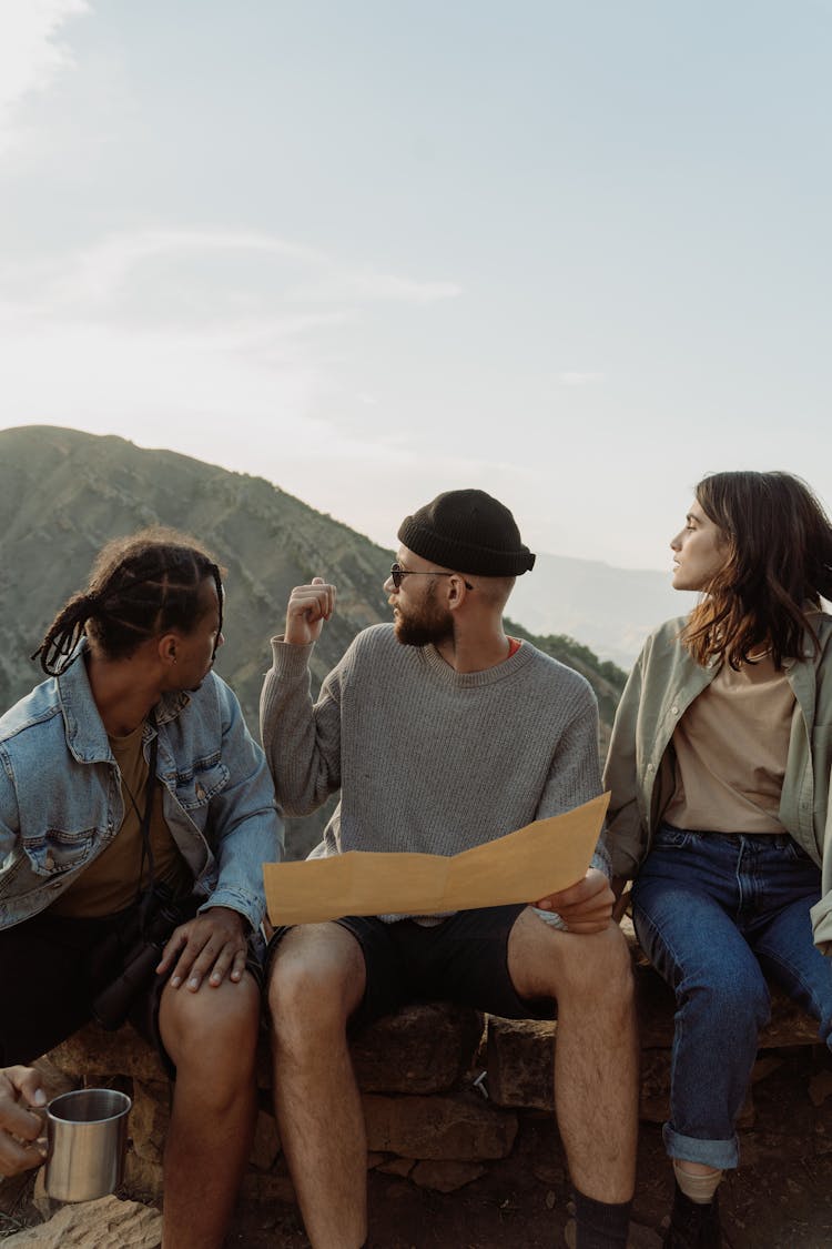 A Group Of People Looking Over Their Shoulders