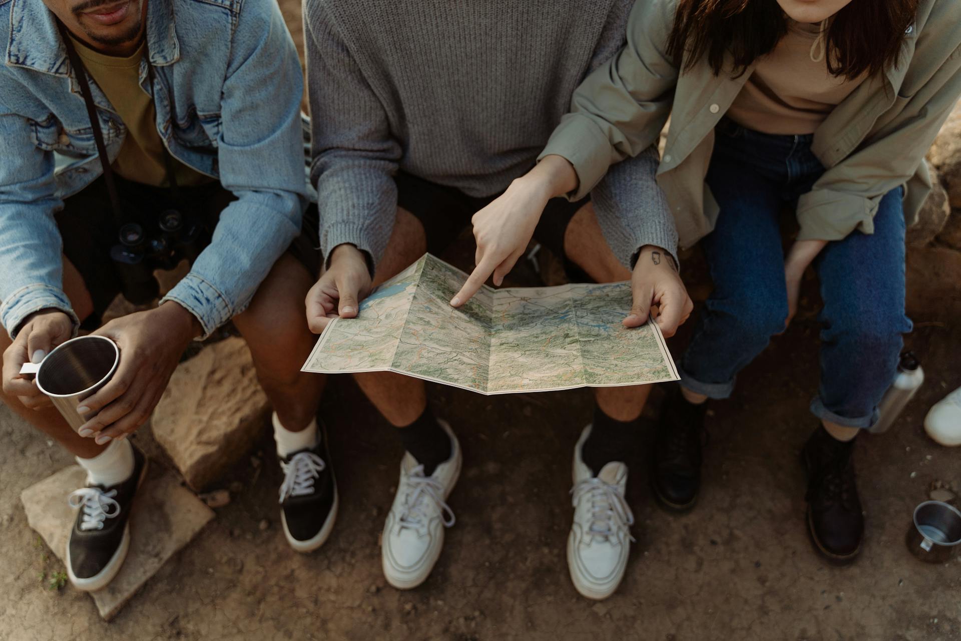 Hikers Sitting with Map