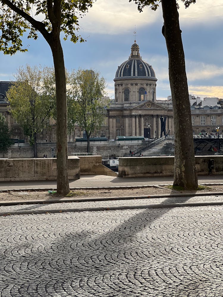 Empty Street Near River In Paris