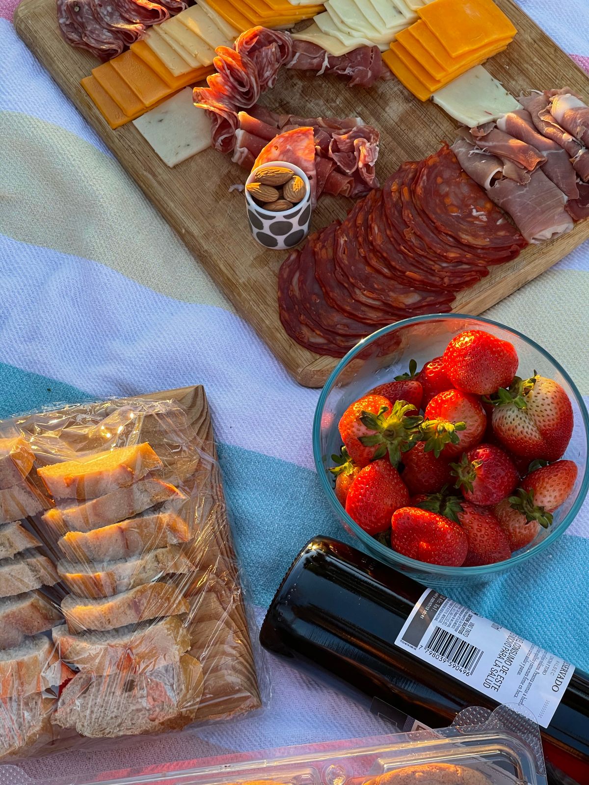 Christmas charcuterie board with strawberries and wine