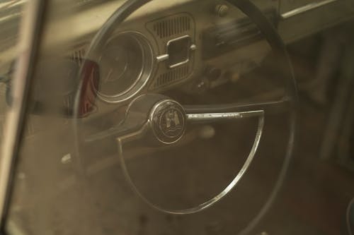 Free A Steering Wheel of a Vintage Car Stock Photo