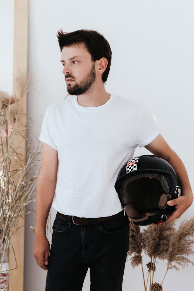 Man Holding Motor Cross Helmet