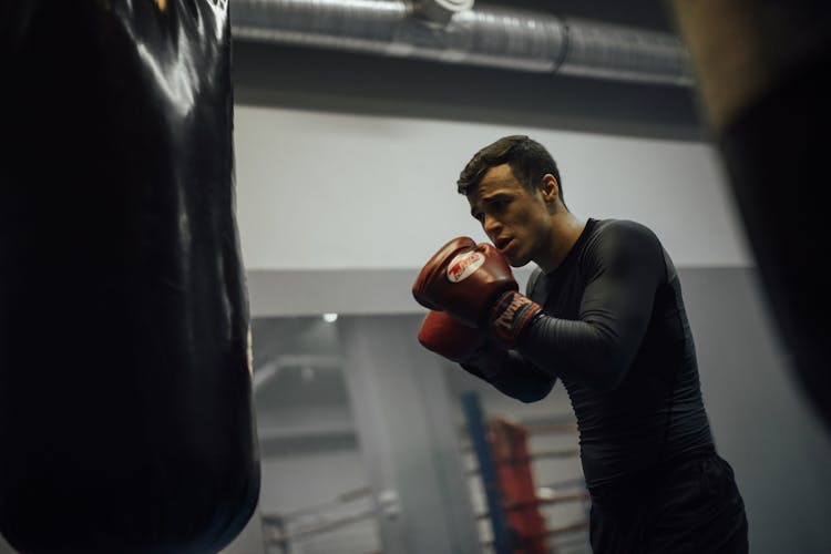 A Man Training In The Boxing Gym