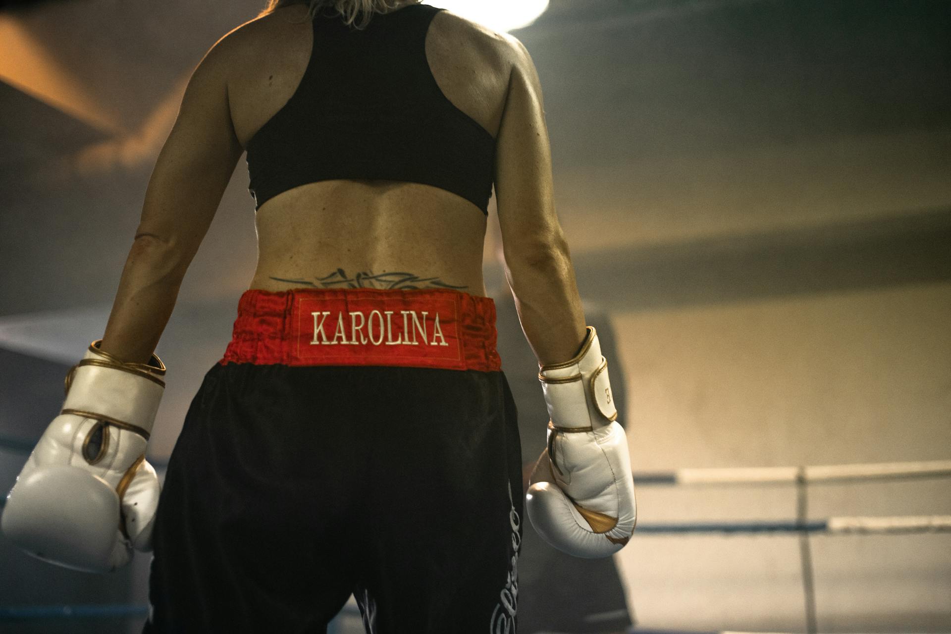 Back View of a Boxer Wearing White Boxing Gloves