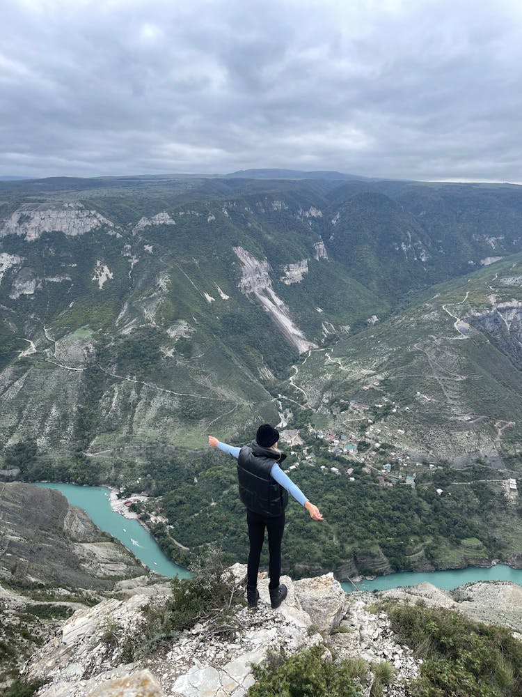 Hiker On Mountain Peak