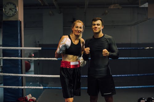 Free A Man and Woman Inside the Boxing Ring Stock Photo