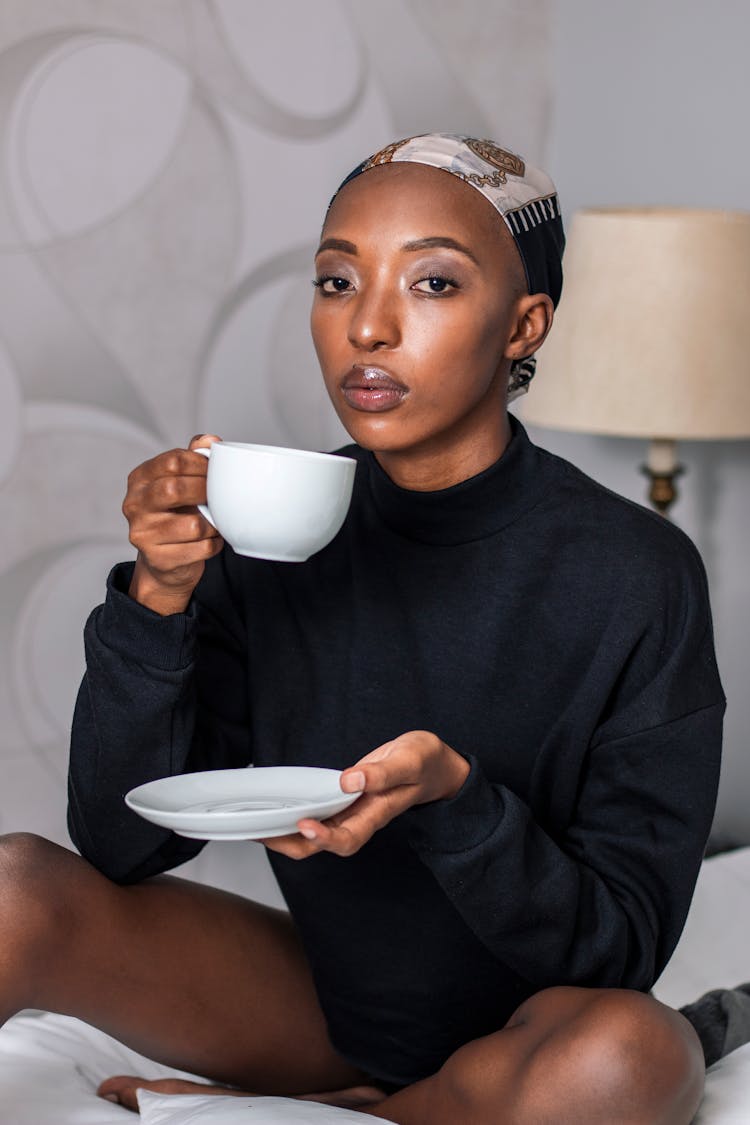 African Model Holding Cup And Plate