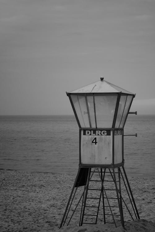 Grayscale Photo of a Lifeguard Post 