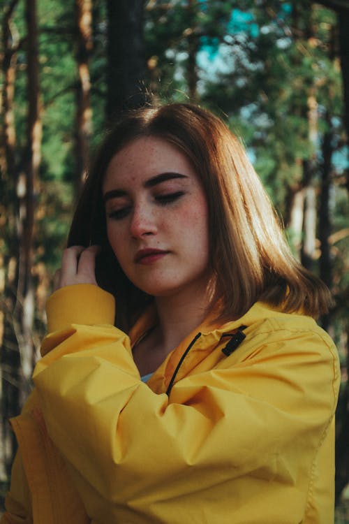 Portrait of Woman in Yellow Rain Coat