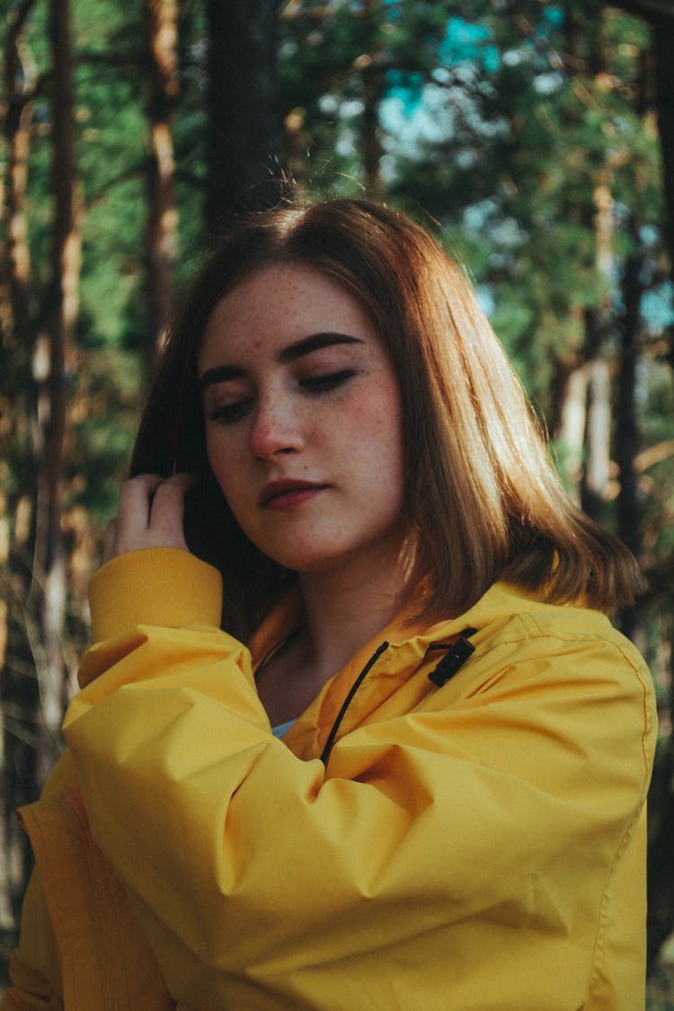 Portrait Of Woman In Yellow Rain Coat