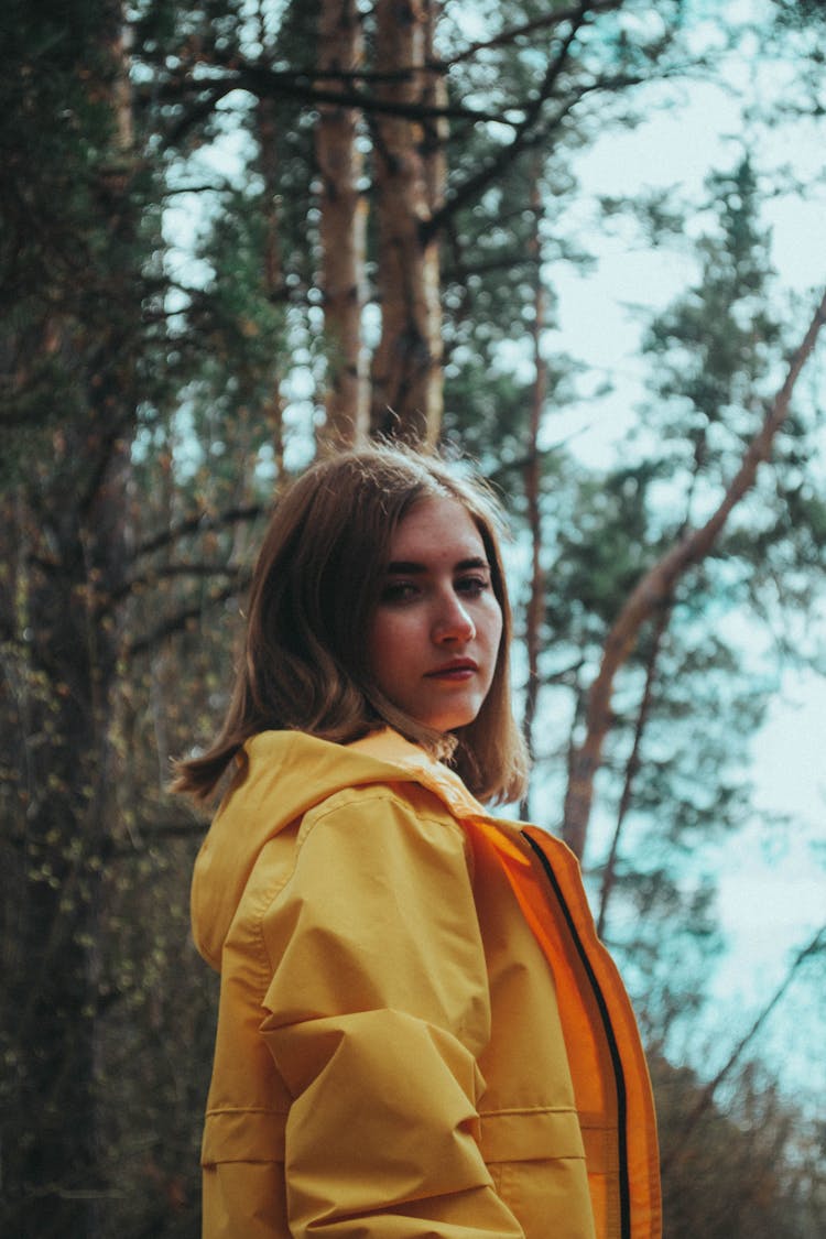 Portrait Of Woman In Yellow Coat