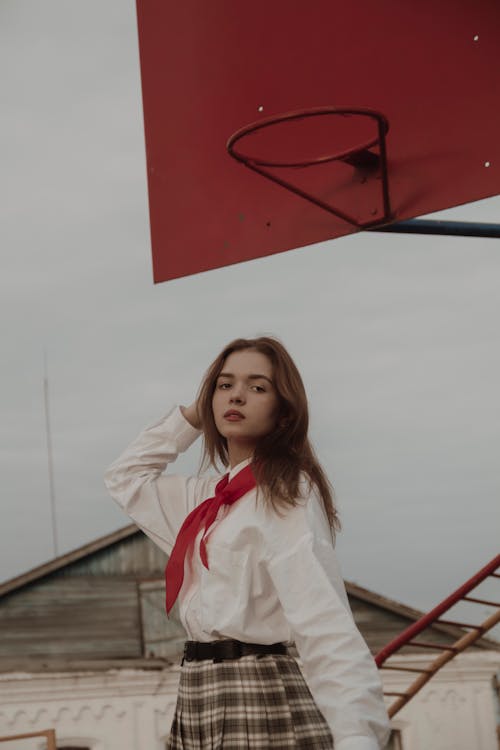 Portrait of Brown Hair Girl With her Hand in Hair