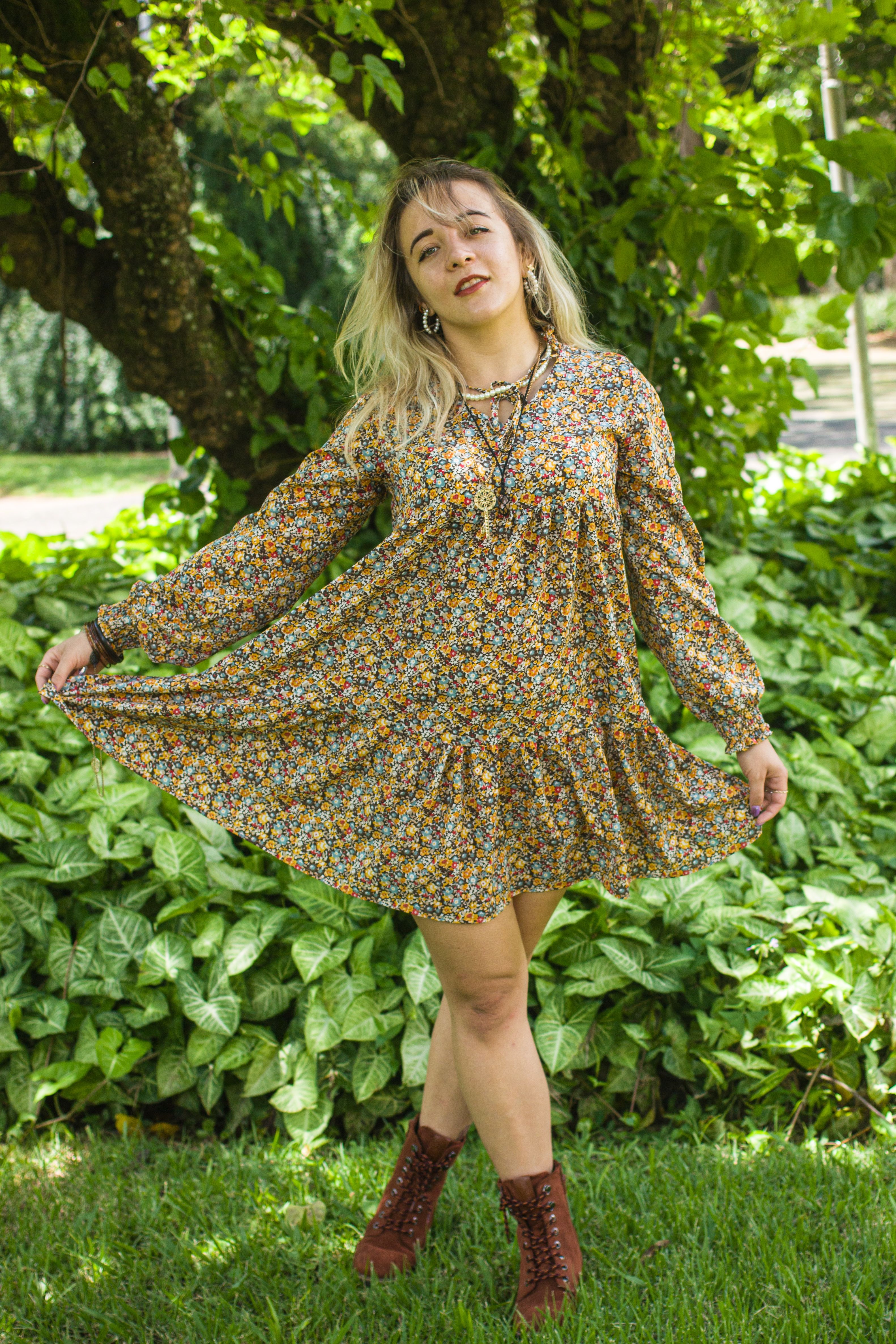A Woman in Floral Dress Posing  Free Stock Photo