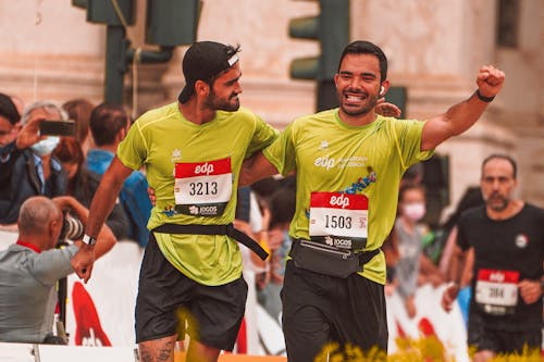 Free Men After Completing a Marathon  Stock Photo