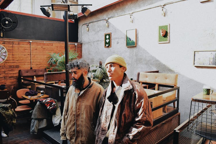 Men Waiting On Restaurant Patio